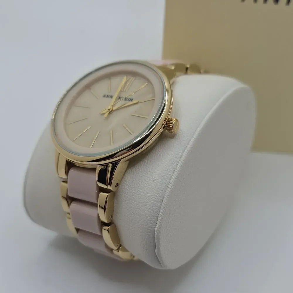 Anne Klein Women’s Analog Watch Pink Dial Gold-Tone Bracelet Roman Numerals Box